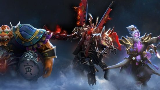 Three Dota 2 characters stand together in mist