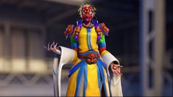 Overwatch 2 Lunar New Year event: The Moira Mask Dancer legendary skin as depicted in the hero gallery, which features Moira in colourful robes and wearing a traditional mask.