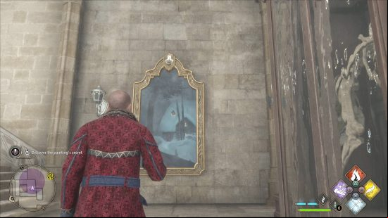 Hogwarts Legacy Cache in the Castle - a Hufflepuff student wearing a red jacket is staring at a painting of a house covered in snow that's hanging on the wall near a staircase.