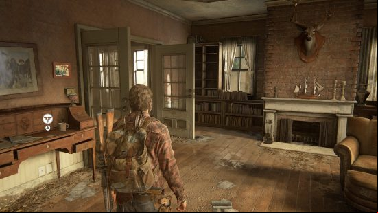 The Last of Us Firefly Pendants locations: a man stands in an abandonded, but warmly lit, house.