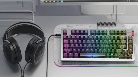 A pair of headphones connected to the FiiO HiFi Audio Mechanical Keyboard.