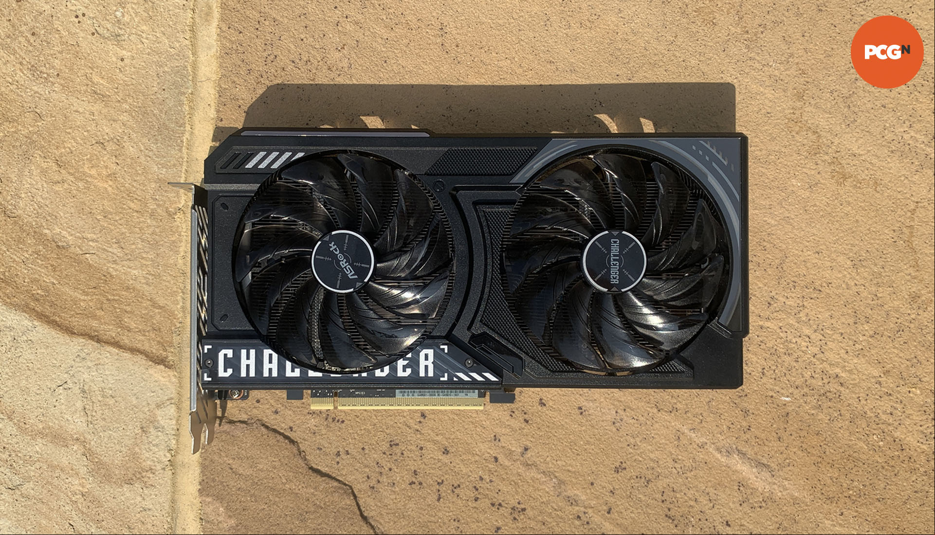 AMD Radeon RX 9060 XT review: ASRock Challenger OX graphics card front.